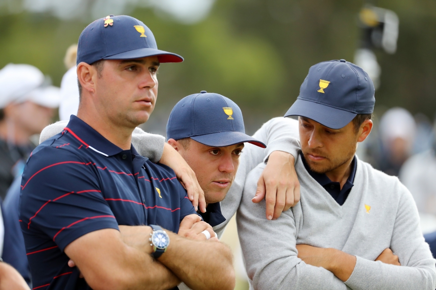 Gary Woodland, Justin Thomas a Xander Schauffele 