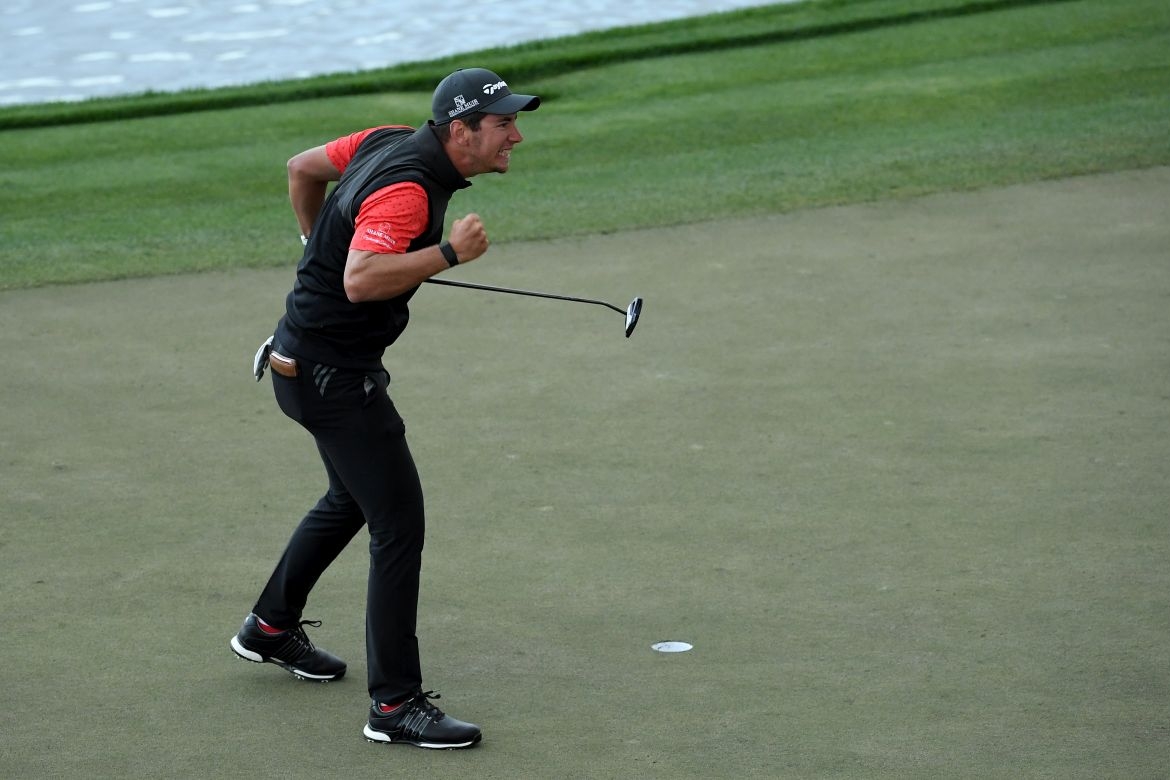 Momentka z finálového kola Omega Dubai Desert Classic, po kterém se radoval ze svého premiérového titulu na European Tour Australan Lucas Herbert (foto: GettyImages)