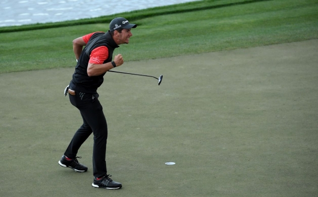 Momentka z finálového kola Omega Dubai Desert Classic, po kterém se radoval ze svého premiérového titulu na European Tour Australan Lucas Herbert (foto: GettyImages)