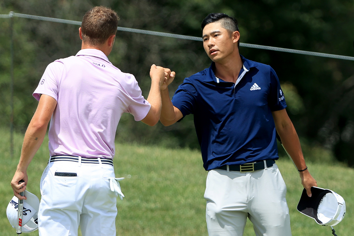 Collin Morikawa a Justin Thomas